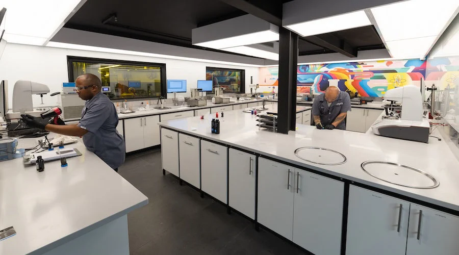 NUtec Digital Ink modern lab with technicians working on digital printing ink development and testing in a high-tech facility